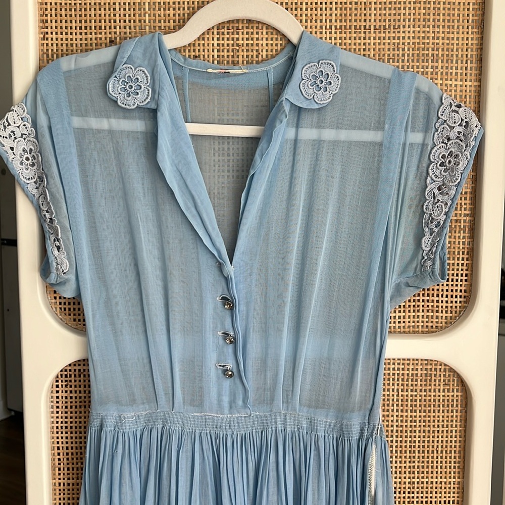 Summer vintage dress light blue with lace detail $ rhinestone buttons. Small